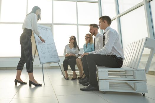 business woman makes a presentation of a new project . the concept of a startup