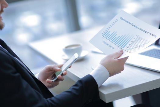 Close-up of manager working with financial documents.photo with copy space
