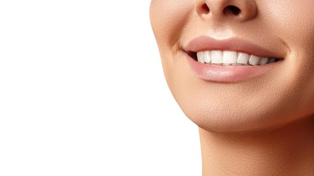 Wide smile of young beautiful woman with perfect healthy white teeth on grey background. Dental whitening, ortodont, care tooth and wellness. Natural makeup on perfect face.