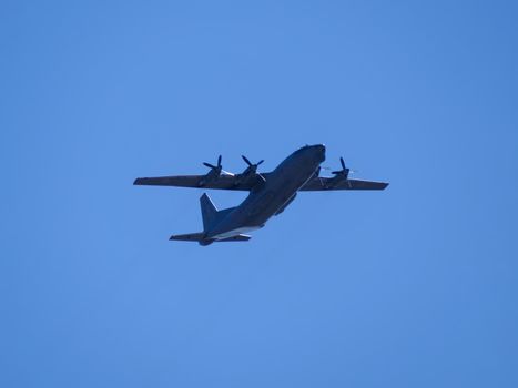 Russia, St. Petersburg - June 24, 2020: Russian military an-12 plane of the Russian Air Force in flight at the Victory Parade in World War II.