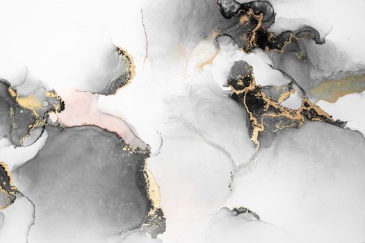 Black gold abstract background of marble liquid ink art painting on paper . Image of original artwork watercolor alcohol ink paint on high quality paper texture .