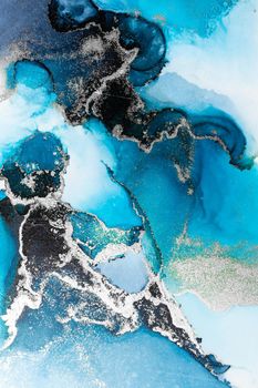 Blue silver abstract background of marble liquid ink art painting on paper . Image of original artwork watercolor alcohol ink paint on high quality paper texture .