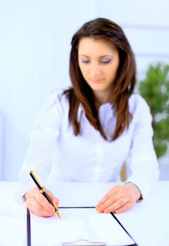 Beautiful business woman working at desk