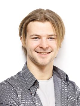 The beautiful young man on a white background