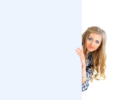 Happy smiling young business woman showing blank signboard