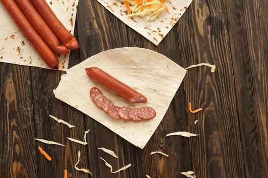 sausage and cabbage for making homemade Shawarma. fast food.