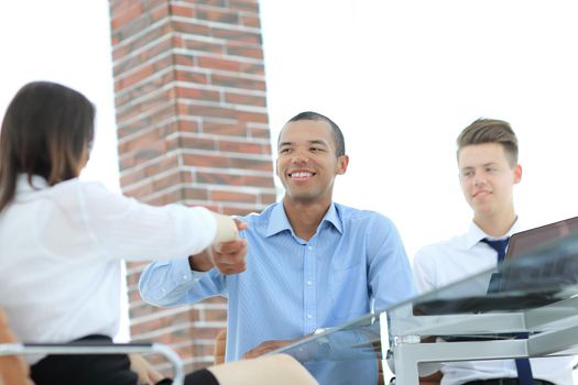 closeup.a handshake of a Manager and employee in the office.business concept