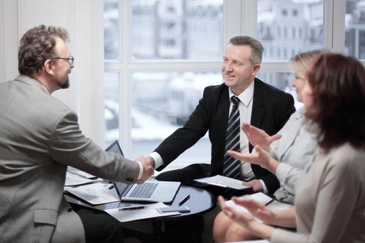 handshake business partners after discussion of the contract.the concept of partnership