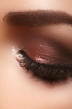 Closeup Macro of Woman Face with Eyes Make-up. Fashion Celebrate Makeup, Glowy Clean Skin, Extra Long Eyelashes.