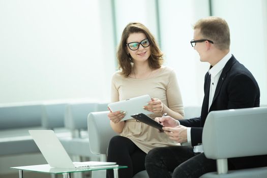 businessman and business woman discussing business documents .photo with copy space