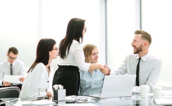 handshake of business people in the workplace in the office.office weekdays