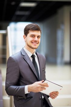 young businessman with a tablet pc, at the office