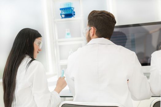 group of scientists biologists working in the laboratory. science and health