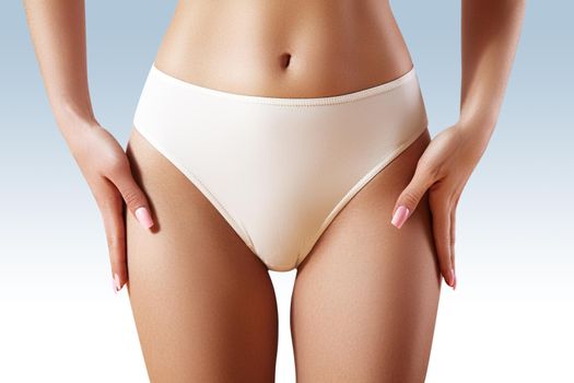 Spa and wellness. Healthy slim body in white panties. Beautiful sexy hips. Fitness or plastic surgery. Perfect buttocks without cellulite.