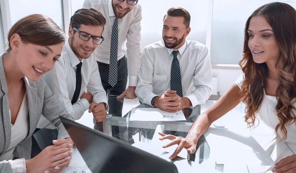 business team uses a laptop at a work meeting .office weekdays