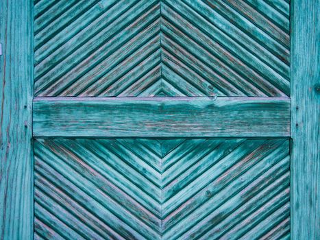 Texture of wooden boards green blue bright color. Wood background. diagonal boards. Mint green painted old rural vintage planks