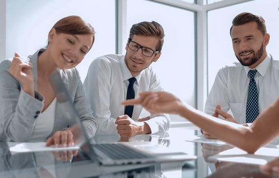 smiling business team at the Desk. office weekdays