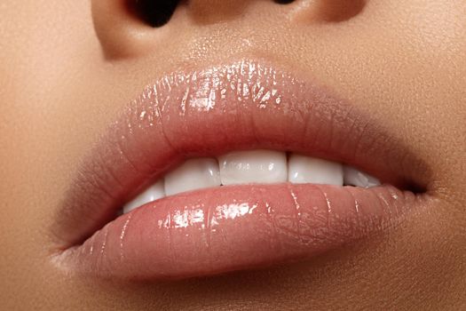 Closeup plump Lips. Lip Care, Augmentation, Fillers. Macro photo with Face detail. Natural shape with perfect contour. Close-up perfect natural lip makeup beautiful female mouth. Plump sexy full lips