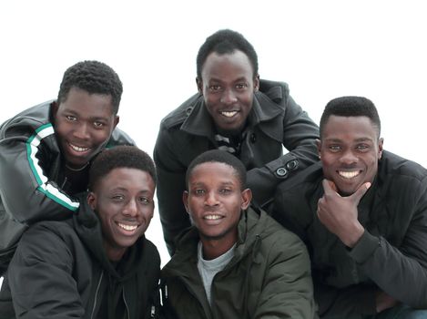 close up. group of friends looking at the camera. isolated on white background