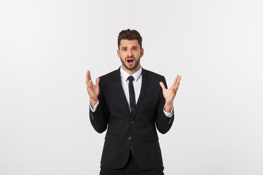 Shocked surprised businessman looking at camera with big eyes. isolated on white, looking at camera.