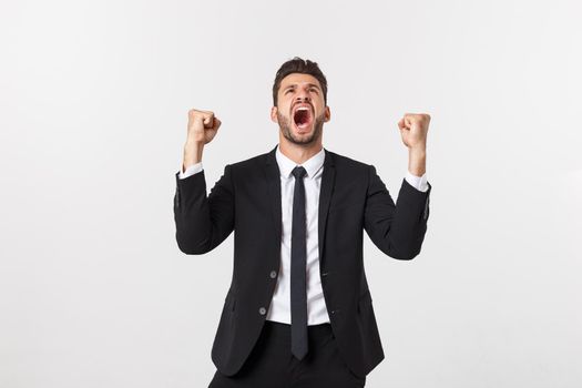 Closeup portrait excited energetic happy, screaming, business man winning, arms, fists pumped celebrating success isolated white background