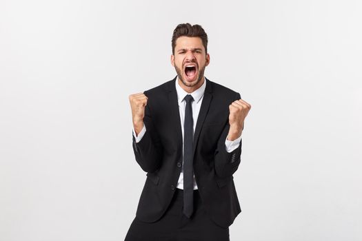 Closeup portrait excited energetic happy, screaming, business man winning, arms, fists pumped celebrating success isolated white background