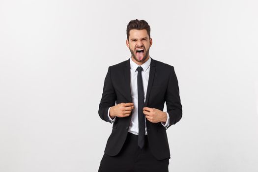 Portrait of a energetic young business man enjoying success, screaming against white - Isolated