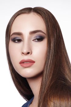 Beautiful Woman with Professional Makeup. Celebrate Style Eye Make-up, Perfect Eyebrows, Shine Skin. Bright Fashion Look.