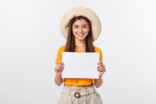 Woman holding blank card. Isolated on white background smiling female portrait.