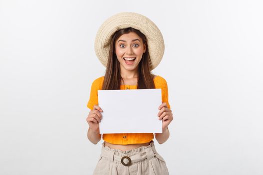 Woman holding blank card. Isolated on white background smiling female portrait.