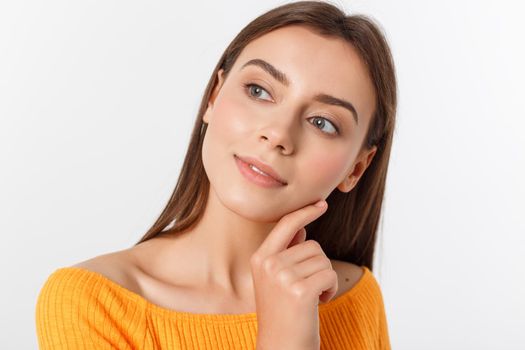 friendly smiling young woman with beatiful face portrait studio shot.