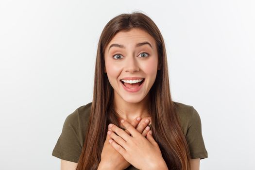 Portrait joyful outgoing woman likes laugh out loud not hiding emotions giggling chuckling facepalm close eyes smiling broadly white background.