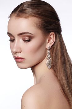 Closeup Portrait of Beautiful Bride Wearing Fashion Wedding Dress with Luxury Makeup and Hairstyle, Studio Photo. Young Attractive Model