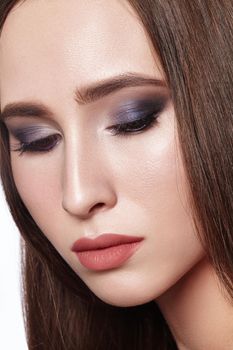 Beautiful Woman with Professional Eye Makeup. Celebrate Style Smoky Eyes Make-up and Shine Skin. Fashion Look.