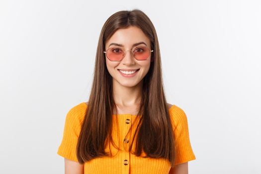 Fashion girl hipster in glasses. White background isolated