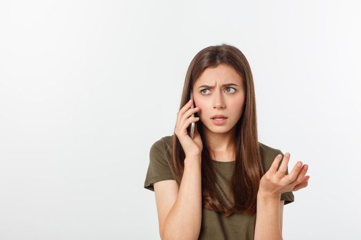 Worried young woman looks nervously, Female is nervous while talking on the phone, feels frustrated and worrying phone talk concept.
