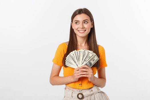 young business woman holding money isolated on white background