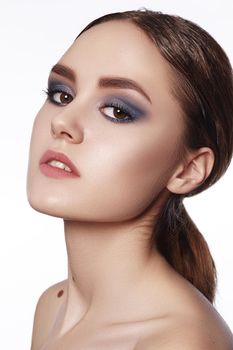 Beautiful Woman with Professional Makeup. Celebrate Style Eye Make-up, Perfect Eyebrows, Shine Skin. Bright Fashion Look.