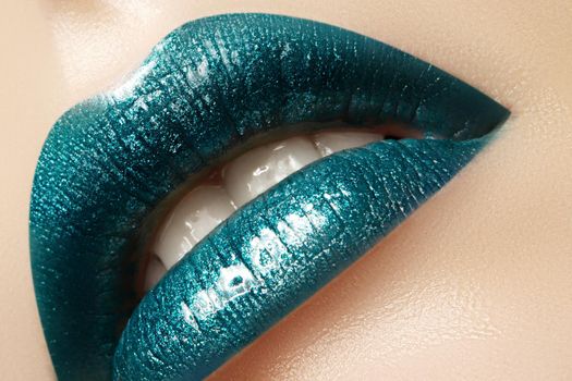 Glamour green Gloss Lip Make-up. Fashion Makeup Beauty Shot. Close-up Sexy full Lips with celebrate Aquamarine glossy lipstick