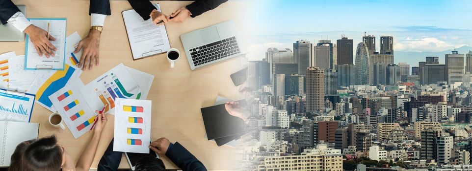 Business people group meeting shot from top widen view in office . Profession businesswomen, businessmen and office workers working in team conference with project planning document on meeting table .