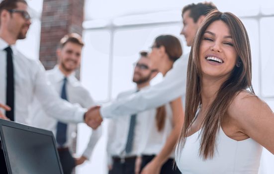 smiling business woman in modern office.the concept of cooperation