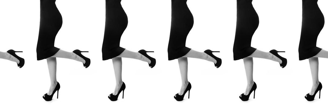 Sexy female slim Legs in Black high Heels on white background. Erotic body shapes. Perfect footwear, shoes. Seamless wallpaper