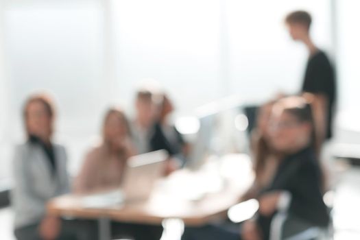 background image of a working group at an office meeting. business background