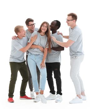 in full growth. group of diverse young people in identical t-shirts. isolated on white background