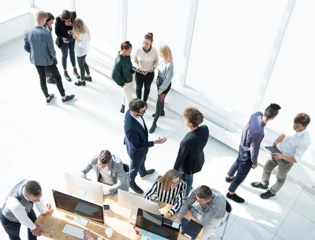 top view. business team operates in a modern office . business concept