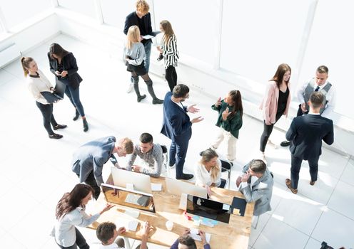 top view. business team operates in a modern office . business concept