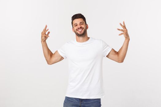 Charming handsome. Handsome young man in casual wear while standing isolated on white background.