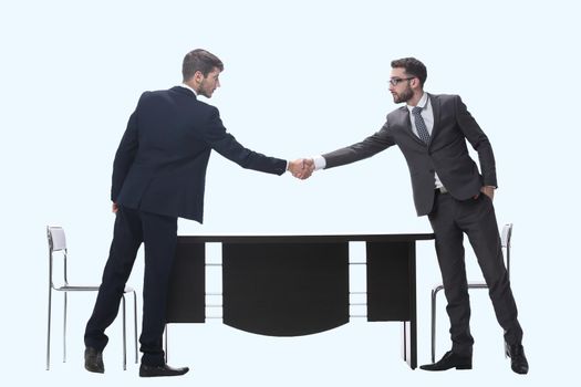 two business people shaking hands . isolated on white background