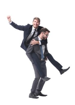 happy businessman carrying his colleague on the piggyback . isolated on white background