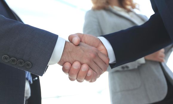 Businessmen shaking hands making an agreement